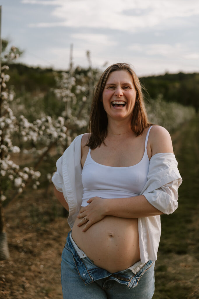 Capturing Newborn and Maternity Photoshoots in Vermont’s Scenic Spring Apple Orchards with Damini Photography.