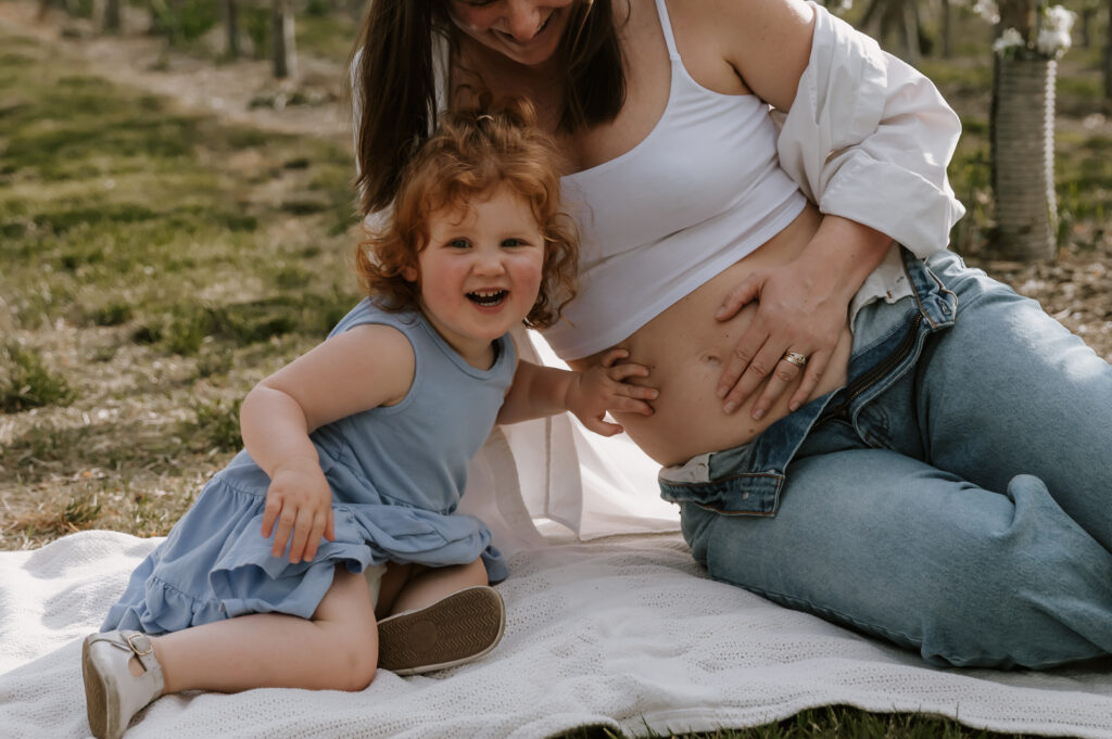 Damini Photography: Capturing Newborn and Maternity Moments in Vermont’s Spring Apple Orchards.
