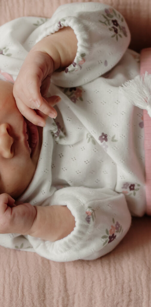 Detailed photo of a newborn during a photoshoot in New England.