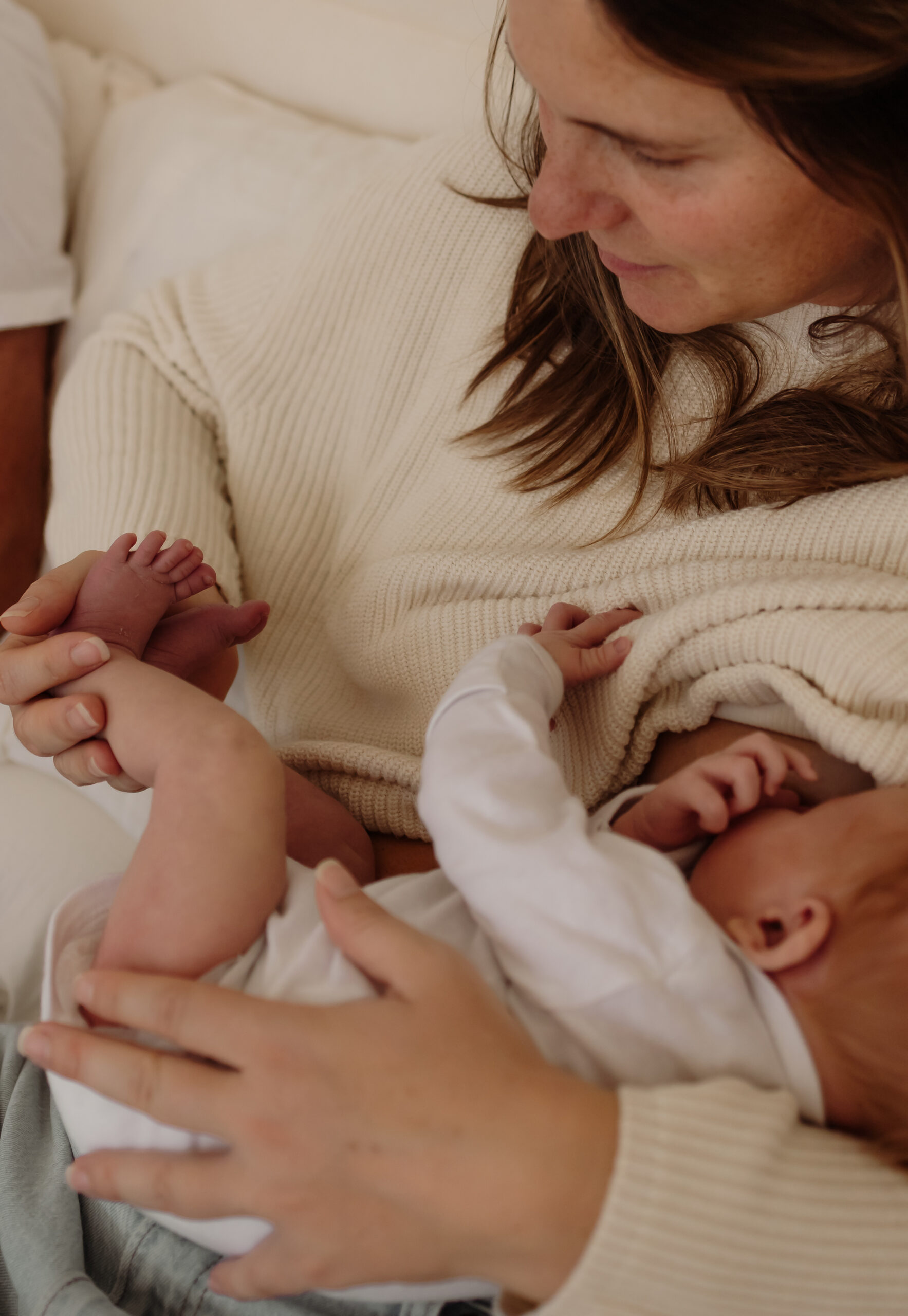 Warm and cozy in-home family photography in Maine capturing love and connection