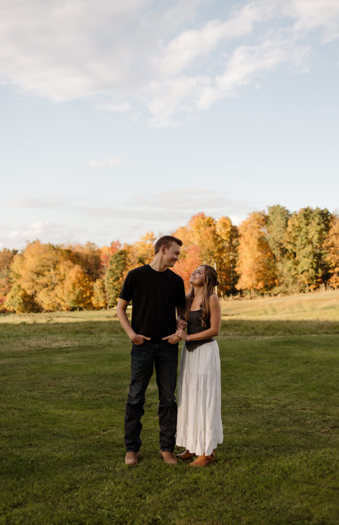Romantic couple portraits during peak foliage season in Rangeley Maine