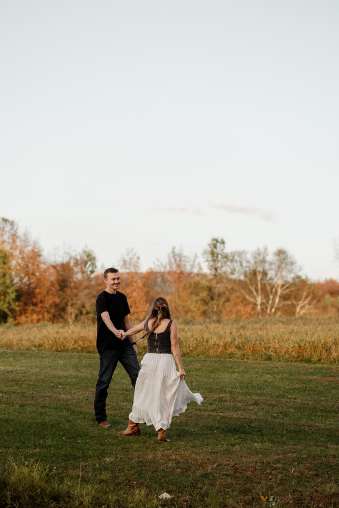 Romantic autumn portraits with vibrant foliage background | Fall engagement photos Rangeley Maine
