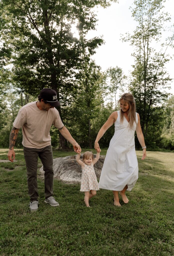 Gardiner Maine family photos showing a loving family spending quality time together in their backyard during a lifestyle session"